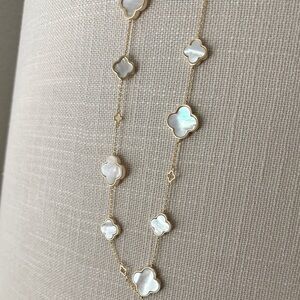 Elegant Gold and White Clover Necklace